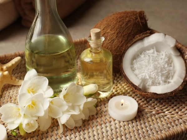 Hot coconut oil massage